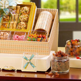 Close-up of Grand Delights Gourmet Hamper with premium dry fruits, candies, and sweets in elegant packaging, perfect for gifting occasions.